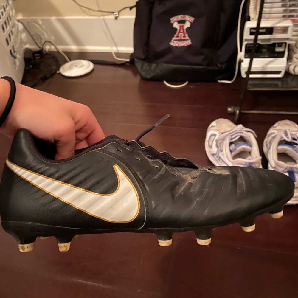black white and gold nike soccer cleats